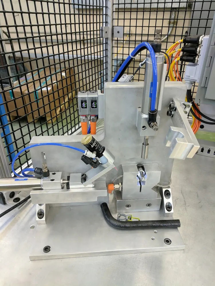 Clamp bonding fixture detail with pneumatics and sensors