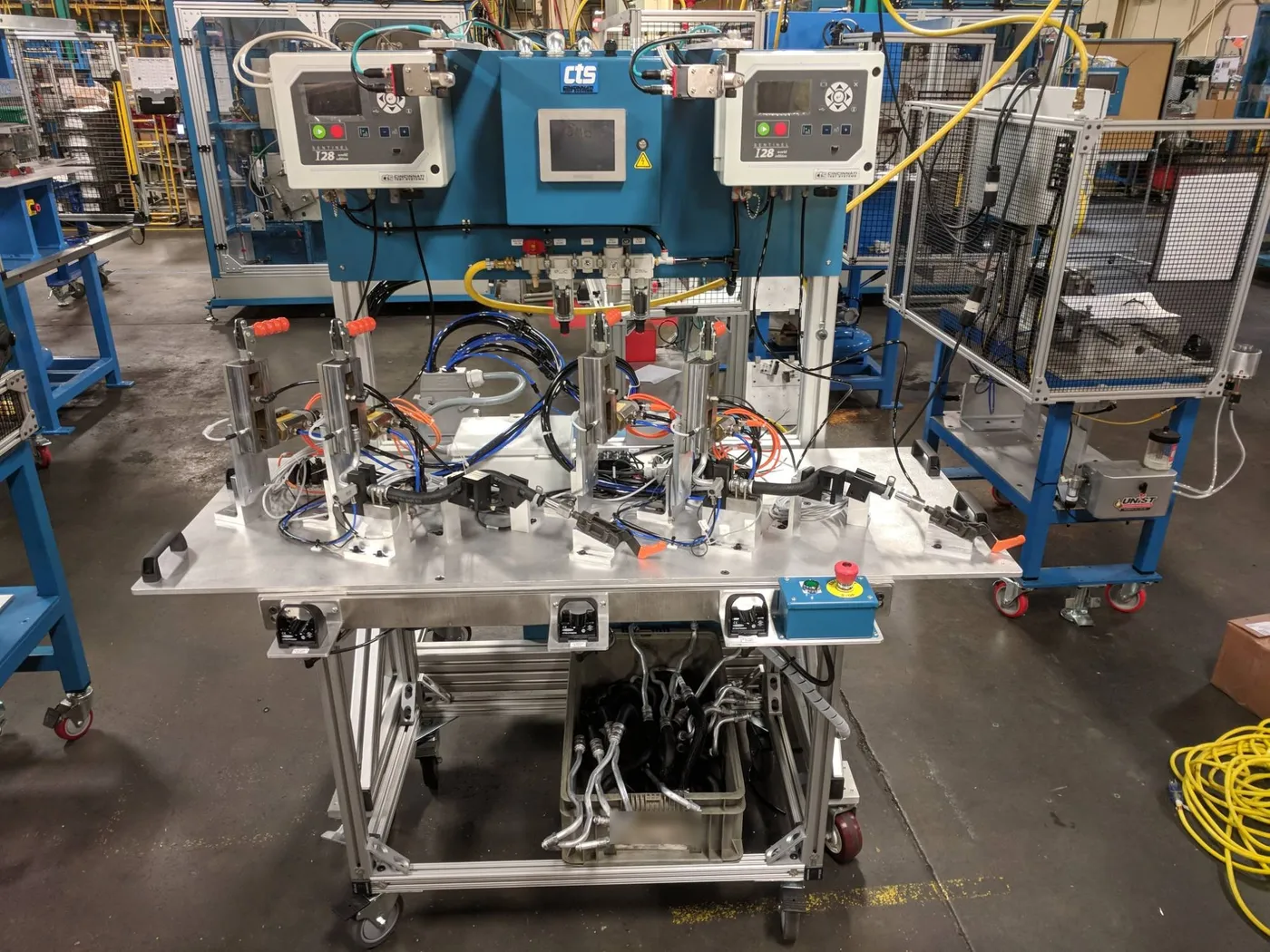Leak test fixture on its rolling cart, running in the plant