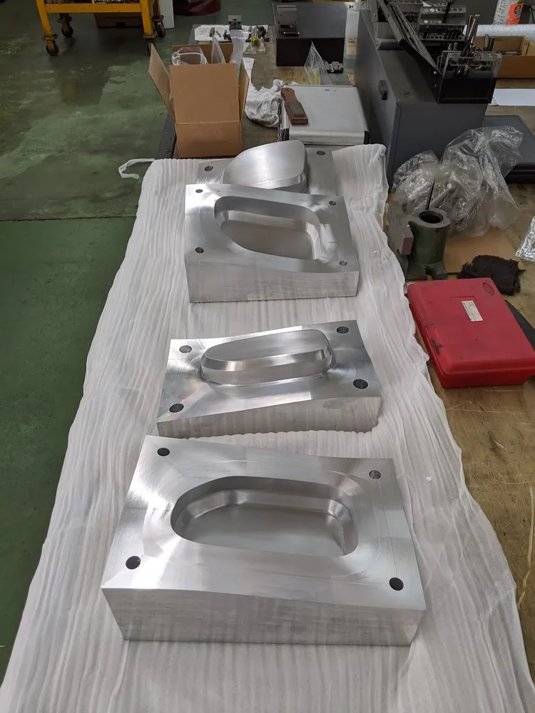 Machined injection mold cavities