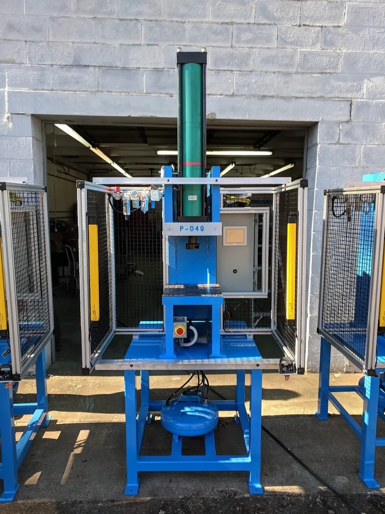 The same press rebuilt, powder coated, guarded and fitted with new controls