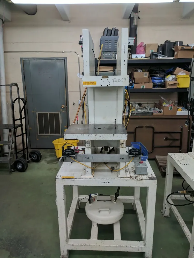 The legacy swaging press before rebuild, unguarded and worn