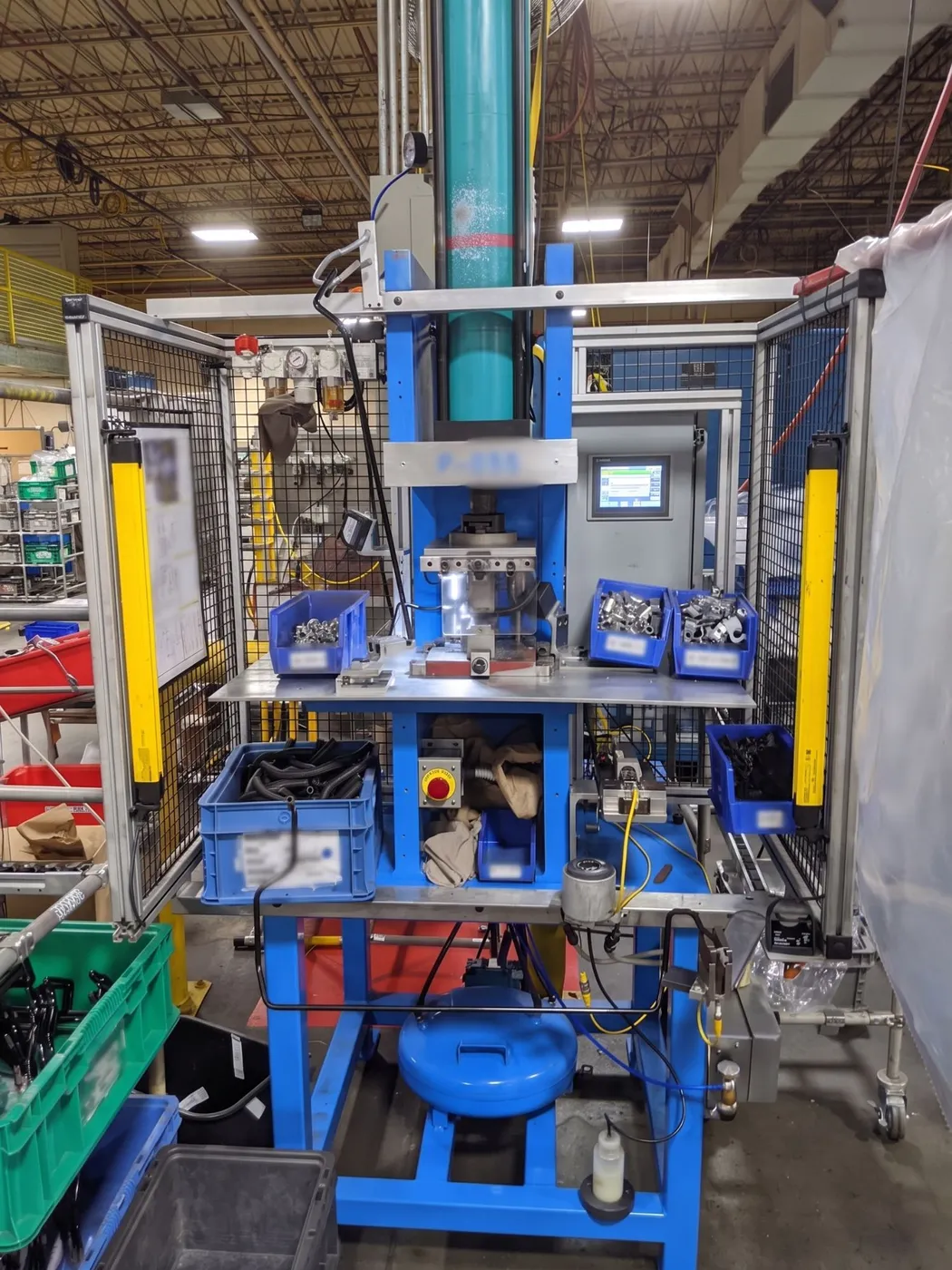 Rebuilt hydraulic crimping press running in production with light curtains