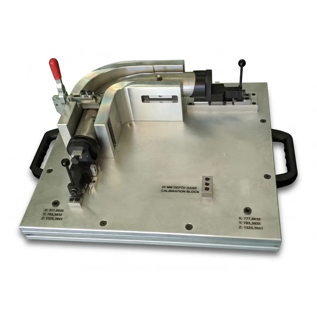 The finished gage with clamps, hard datums, engraved coordinates and calibration block